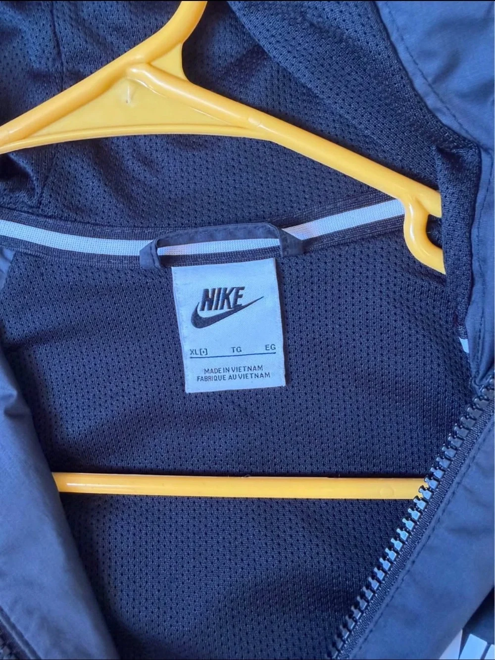 Nike Black Hooded Kids Windbreaker with White Logo Accent